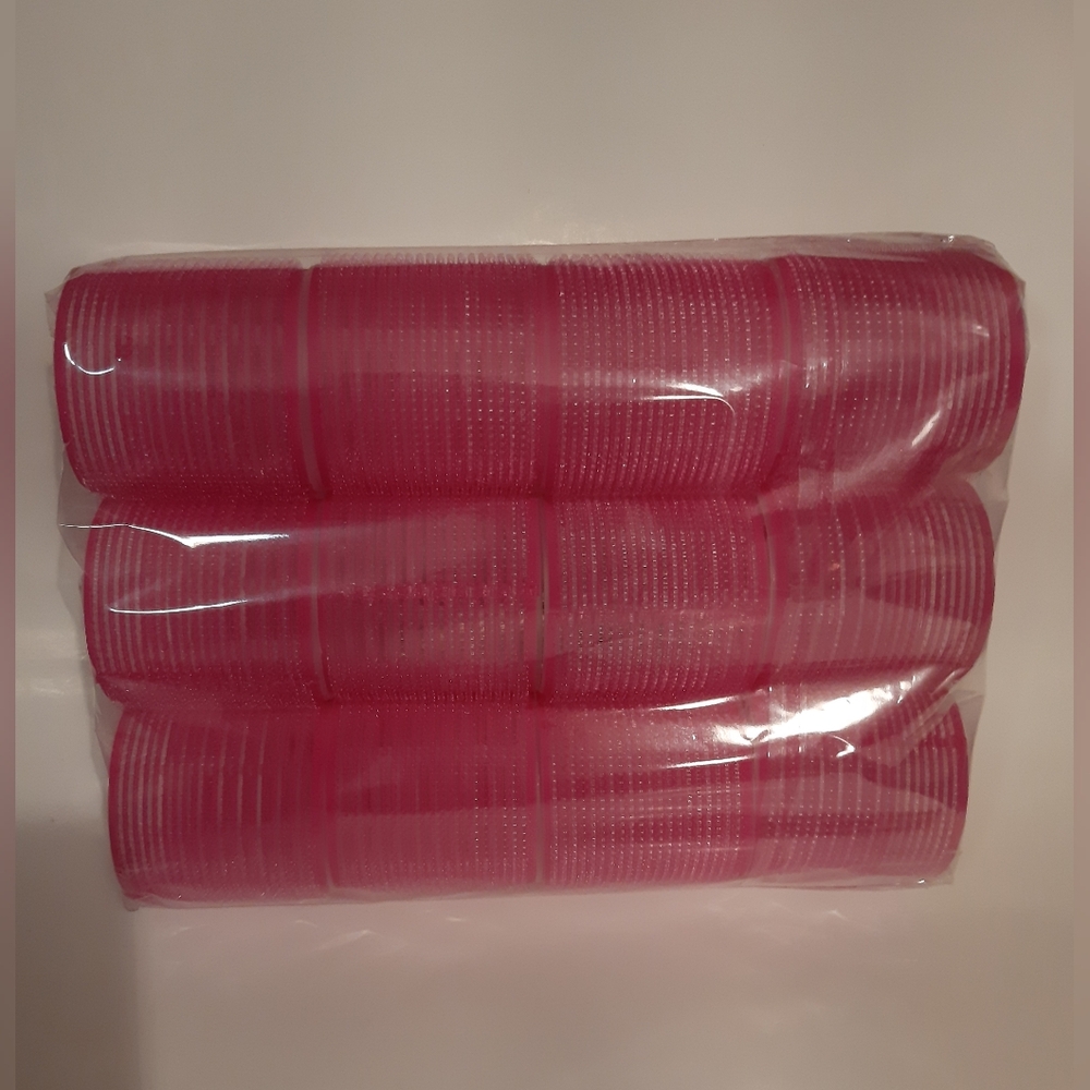Brand new, never opened. Amazon. Pink Jumbo Hair Curlers/Rollers 24 piece set.